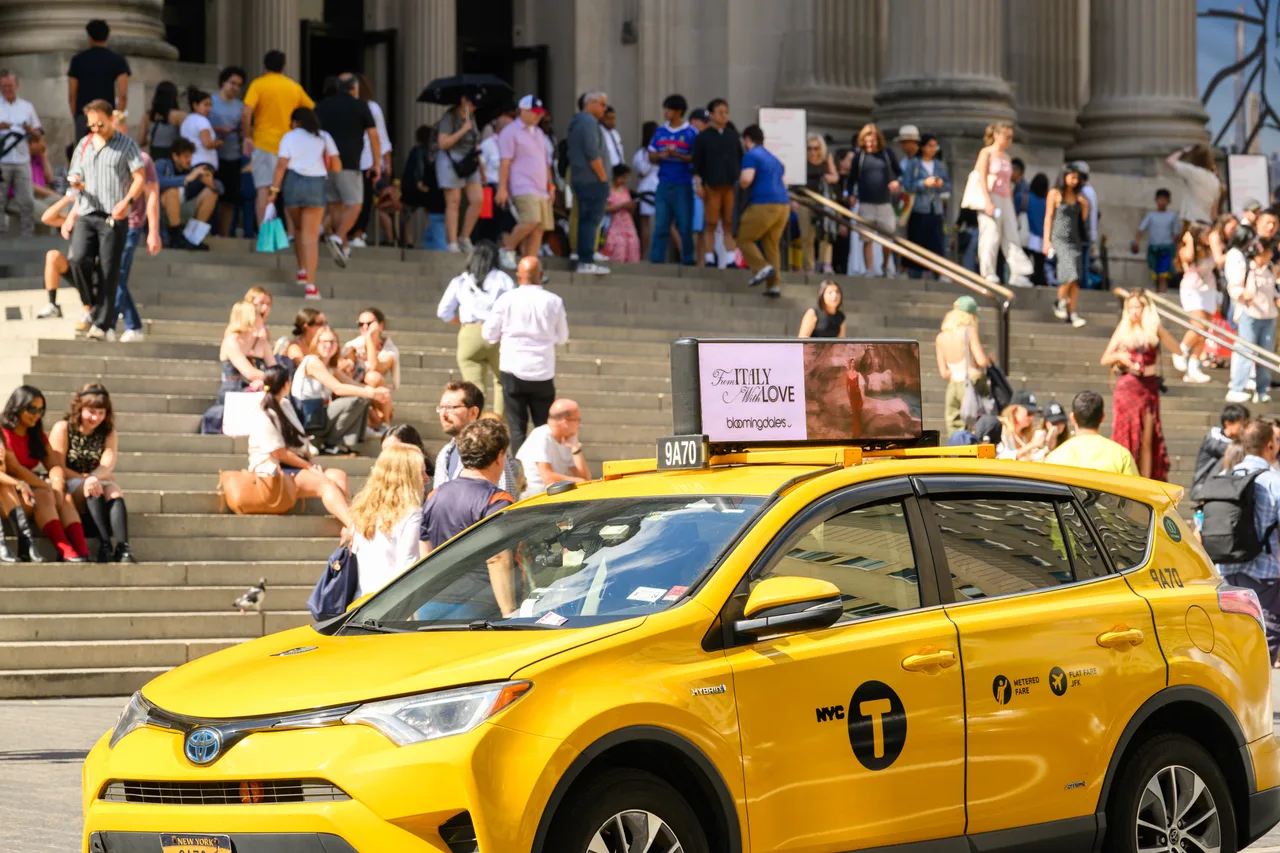 Bloomingdale's campaign on a Firefly digital top vehicle in New York, 2024