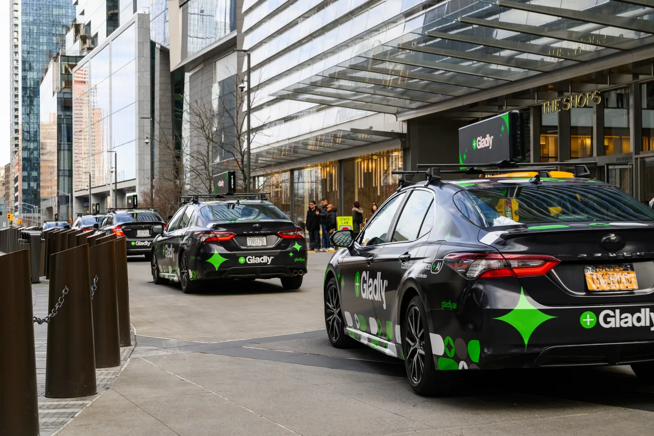 Gladly campaign on a Firefly 360 wrap + digital top vehicle in New York