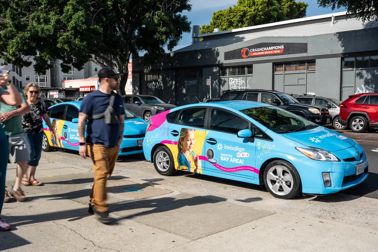 Invisalign campaign on a Firefly 360 wrap + swarm vehicle in San Jose
