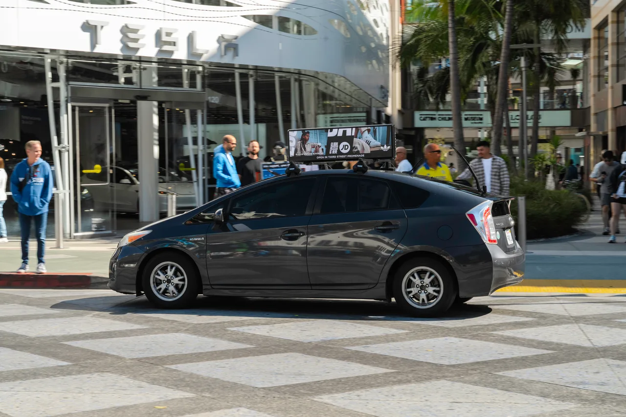 JD Sports campaign on a Firefly digital top vehicle in Los Angeles, 2025