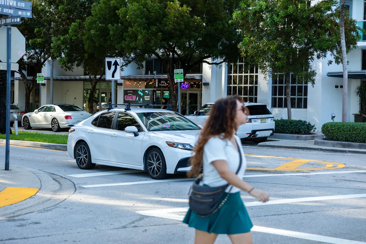 Reggaeton campaign on a Firefly digital top vehicle in Miami, 2024