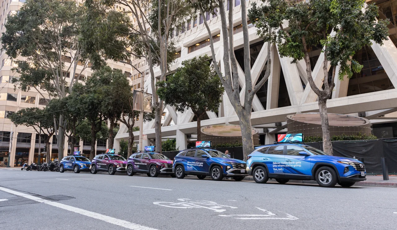 Silicon Valley Bank campaign on a Firefly 360 wrap + digital top vehicle in San Francisco, 2025