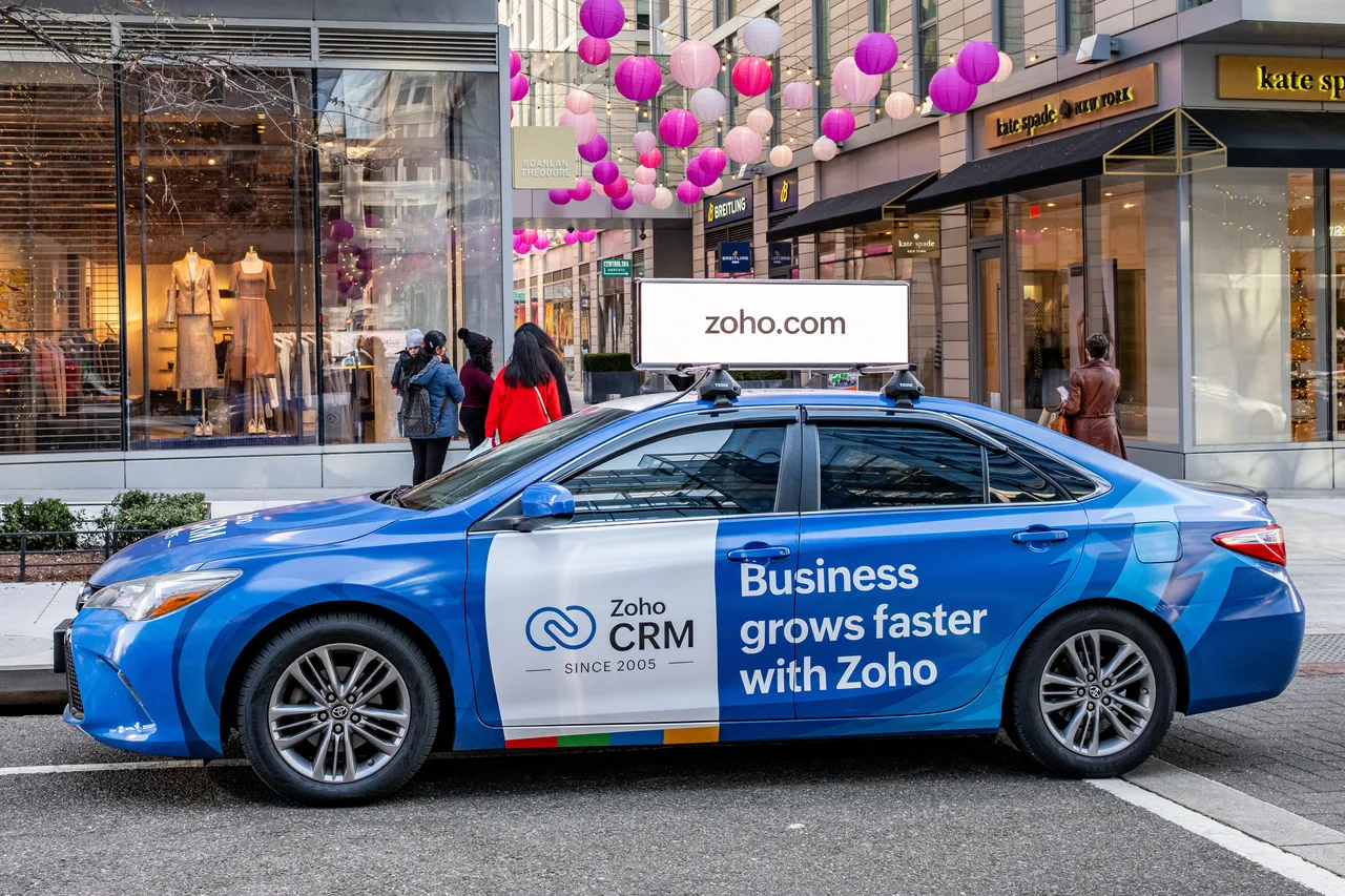 Zoho campaign on a Firefly 360 wrap + digital top vehicle in Washington DC, 2025